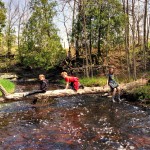 Elias, Donnie and Gabby crossing Baird Creek